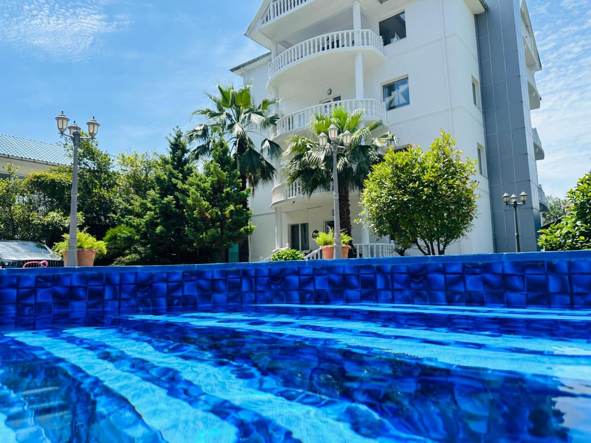 Claude Monet Beach Hotel Ureki Buitenkant foto
